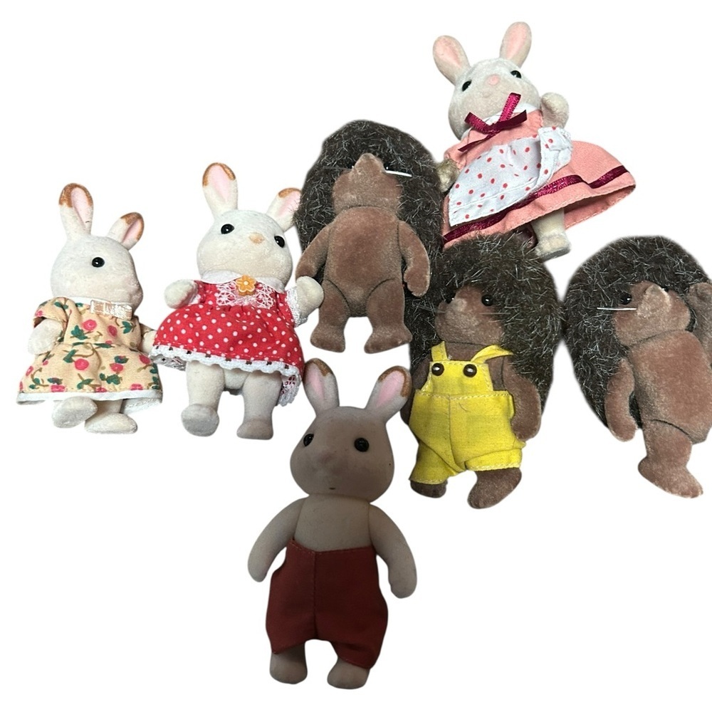 Calico critters lot of 4 bunny and 3 hedgehog family figurines
